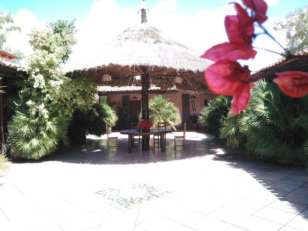 Agriturismo La Mimosa Putzu Idu Bagian luar foto